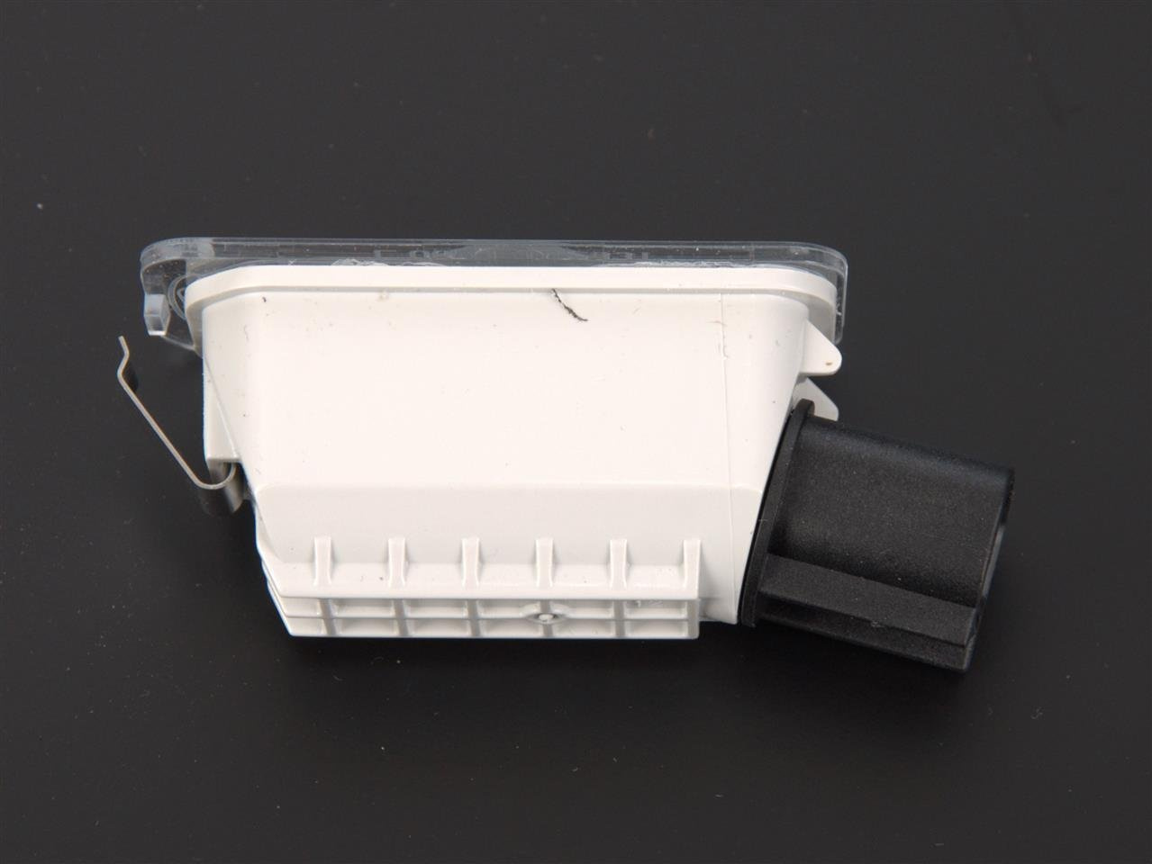 ŚWIATŁO TABLICY REJESTRACYJNEJ FORD MONDEO 07-14 _ 1479968 _ 7S71-13550-AB