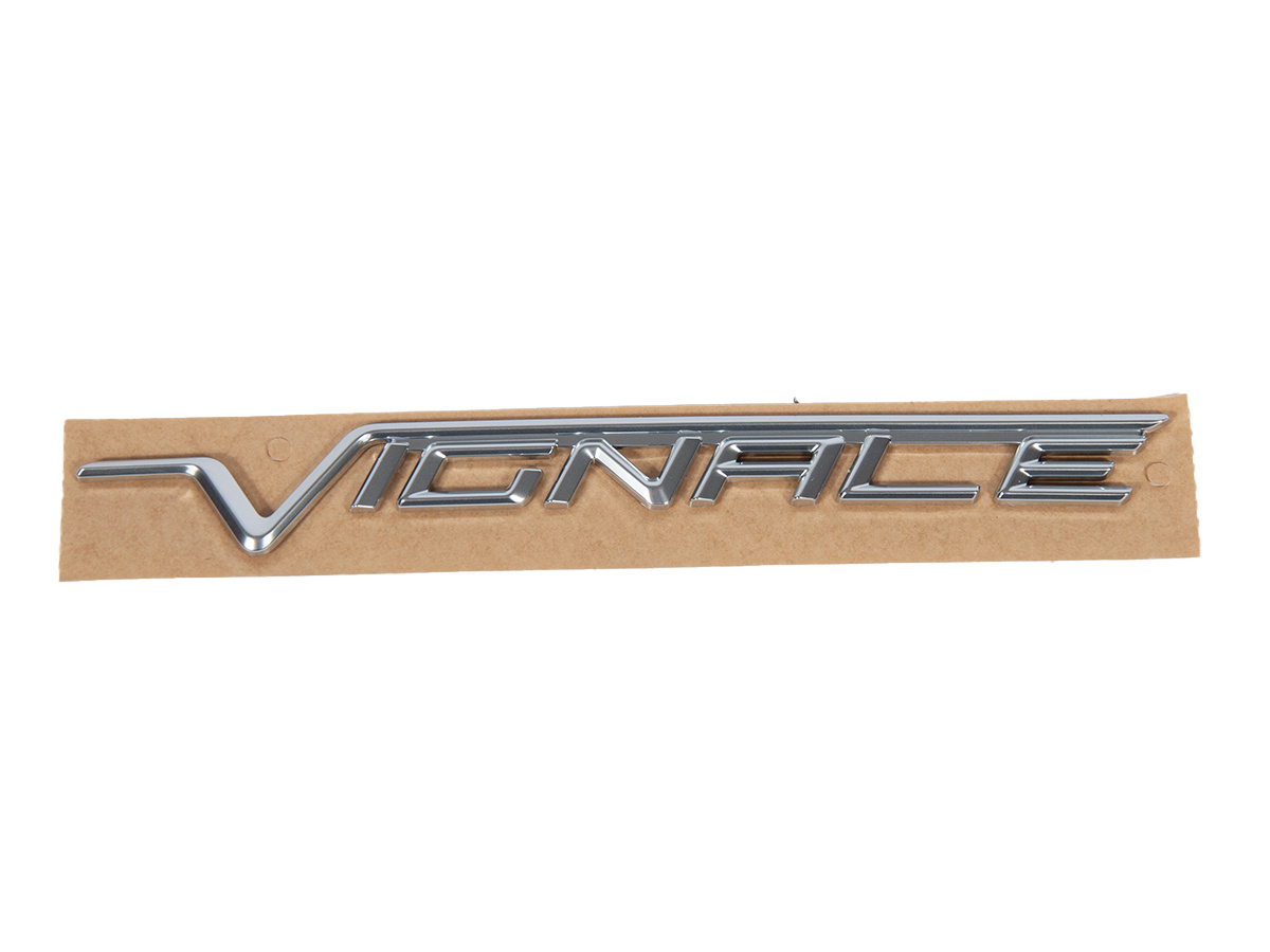 EMBLEMAT "VIGNALE" NA BŁOTNIK P/L EDGE 18- FORD OE _ 2271733 _ KT4B-R16702-JA