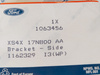 UCHWYT BOCZNY HALOGENU FOCUS 98-05 _ 1063456 _ XS4X-17N800-AA